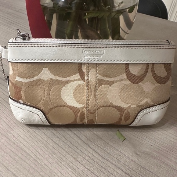 Coach Handbags - Coach Beige and Cream Signature Wristlet
